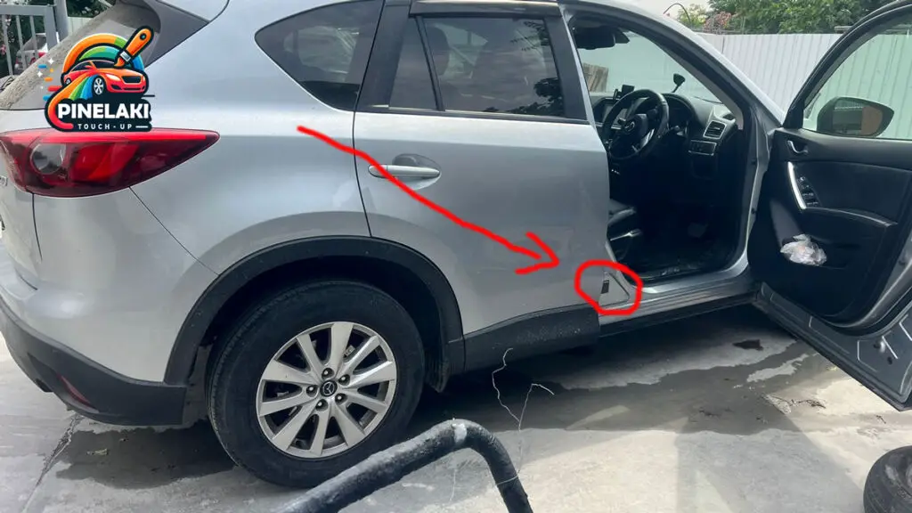 Location of the paint color code on Mazda CX-5 2015